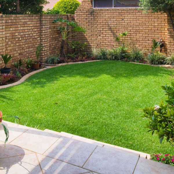Modern house with artificial turf outside